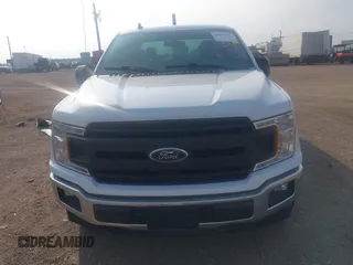 2020 Ford F-150 XL with VIN 1FTFX1E51LKF58027, listed as a IAAI auction lot 41207102 with 162,736 mi miles and . Bid and sale history available at DreamBid. Image 12.