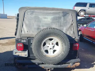 2003 Jeep Wrangler X с VIN 1J4FA39S63P330826, выставлен на аукционе IAAI как лот 41476438 с пробегом 146 517 миль миль и . История ставок и продаж доступна на DreamBid. Изображение 16.