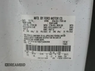 2014 Ford F-150 XL with VIN 1FTFX1ET8EFA56058, listed as a Copart auction lot 51159885 with 199,689 mi miles and Salvage Title. Bid and sale history available at carsss.com. Image 12.