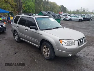 2007 Subaru Forester X with VIN JF1SG63667H717480, listed as a IAAI auction lot 42168265 with 153,085 mi miles. Bid and sale history available at carsss.com. Image 1.