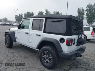 2021 Jeep Wrangler Unlimited Sport Altitude with VIN 1C4HJXDN5MW644613, listed as a IAAI auction lot 42466188 with 63,959 mi miles and . Bid and sale history available at DreamBid. Image 3.