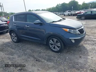 2014 Kia Sportage SX with VIN KNDPC3A6XE7661835, listed as a IAAI auction lot 42480503 with 184,235 mi miles and . Bid and sale history available at DreamBid. Image 1.