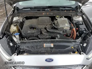 2016 Ford Fusion SE Hybrid z VIN 3FA6P0LUXGR350997, wystawiony jako Copart lot #62301825 z przebiegiem 267 537 mil mil oraz Szkoda całkowita • Salvage title. Historia ofert i sprzedaży dostępna na DreamBid. Obrazek 11.