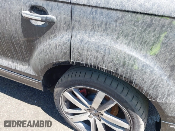 2014 Audi Q7 Premium Plus with VIN WA1LGAFEXED014547, listed as a IAAI auction lot 42256396 with 158,038 mi miles and . Bid and sale history available at DreamBid. Image 6.