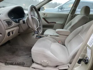 2001 Mitsubishi Galant ES z VIN 4A3AA46G51E020677, wystawiony jako Copart lot #87795655 z przebiegiem 61 145 mil mil oraz Tytuł czysty. Historia ofert i sprzedaży dostępna na DreamBid. Obrazek 7.