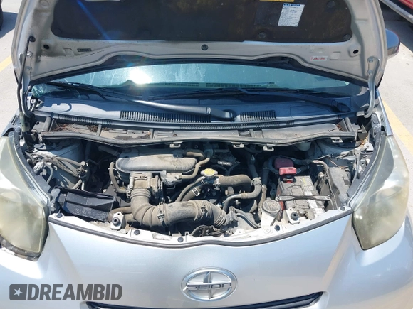 2012 Scion iQ with VIN JTNJJXB07CJ018562, listed as a IAAI auction lot 42404672 with 79,867 mi miles and . Bid and sale history available at DreamBid. Image 10.