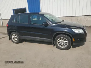 2011 Volkswagen Tiguan with VIN WVGCV7AX8BW511387, listed as a Copart auction lot 57284625 with 284,102 mi miles and Salvage title. Bid and sale history available at DreamBid. Image 4.