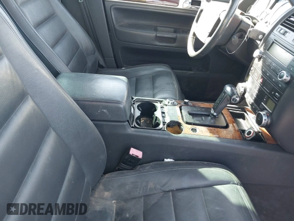 2007 Volkswagen Touareg V6 with VIN WVGZE77L97D026113, listed as a IAAI auction lot 41577000 with 144,118 mi miles and . Bid and sale history available at DreamBid. Image 5.