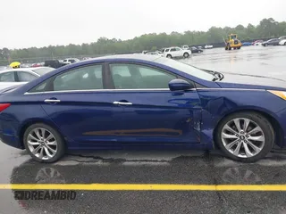 2012 Hyundai Sonata SE z VIN 5NPEC4AC5CH485157, wystawiony jako IAAI lot #42328758 z przebiegiem 222 576 mil mil oraz . Historia ofert i sprzedaży dostępna na DreamBid. Obrazek 13.