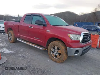 2011 Toyota Tundra with VIN 5TFUY5F11BX166173, listed as a IAAI auction lot 41379226 with 186,712 mi miles and . Bid and sale history available at DreamBid. Image 1.