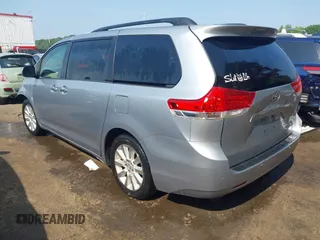 2014 Toyota Sienna Limited with VIN 5TDDK3DC0ES087274, listed as a IAAI auction lot 42478942 with 102,265 mi miles and . Bid and sale history available at DreamBid. Image 3.