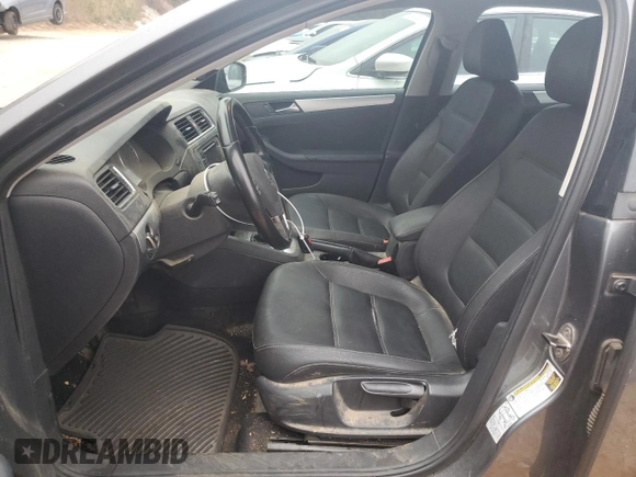 2012 Volkswagen Jetta Sedan SEL w/Sunroof with VIN 3VWLX7AJ7CM389484, listed as a Copart auction lot 83857594 with 212,348 mi miles and Salvage Title. Bid and sale history available at carsss.com. Image 7.