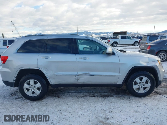 2011 Jeep Grand Cherokee Laredo with VIN 1J4RR4GG7BC584500, listed as a IAAI auction lot 41383355 with 161,722 mi miles. Bid and sale history available at carsss.com. Image 13.
