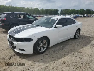2015 Dodge Charger SXT with VIN 2C3CDXHGXFH865725, listed as a Copart auction lot 54217975 with 147,494 mi miles and Salvage Title. Bid and sale history available at DreamBid. Image 1.
