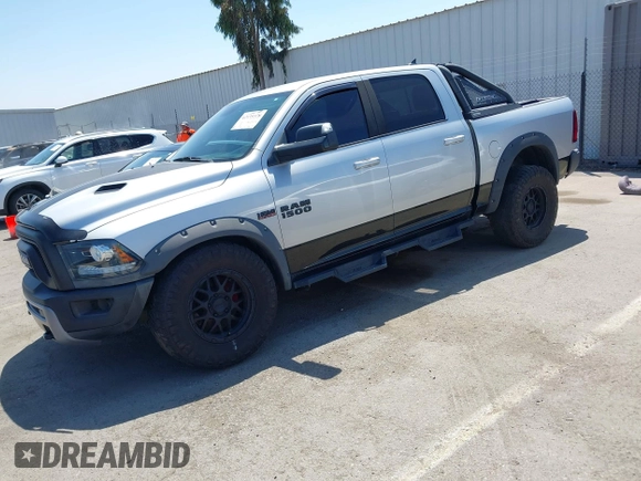2016 Ram 1500 Rebel z VIN 1C6RR7YT5GS251994, wystawiony jako IAAI lot #42139378 z przebiegiem 102 736 mil mil oraz . Historia ofert i sprzedaży dostępna na DreamBid. Obrazek 17.