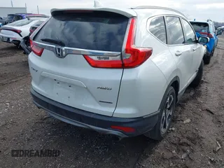 2017 Honda CR-V Touring with VIN 5J6RW2H92HL040217, listed as a IAAI auction lot 41044193 with 180,842 mi miles. Bid and sale history available at carsss.com. Image 4.