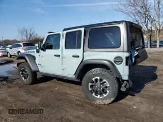 2024 Jeep Wrangler Rubicon with VIN 1C4RJXR61RW255979, listed as a Copart auction lot 43451095 with 7,258 mi miles and Salvage title. Bid and sale history available at DreamBid. Image 2.