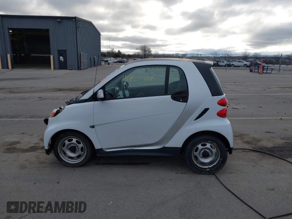 2013 Smart fortwo Pure with VIN WMEEJ3BA2DK702004, listed as a IAAI auction lot 41829808 with 53,545 mi miles and . Bid and sale history available at DreamBid. Image 15.