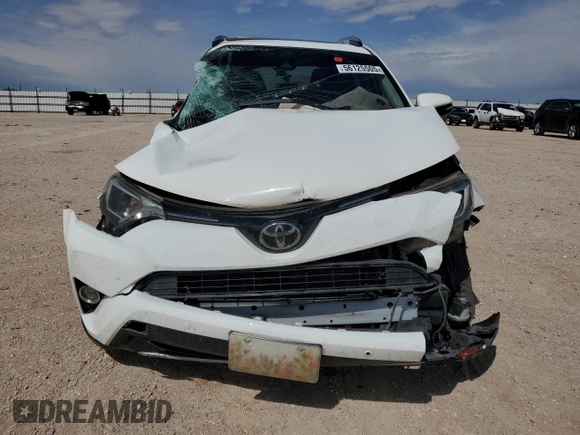 2018 Toyota RAV4 XLE with VIN JTMWFREV9JJ187834, listed as a Copart auction lot 56125505 with Not provided miles and Salvage title. Bid and sale history available at DreamBid. Image 5.