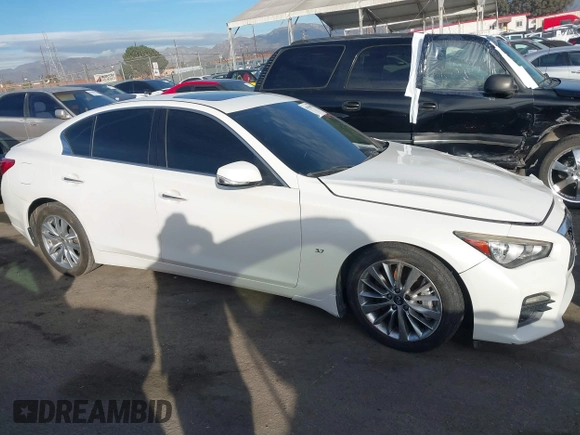 2015 Infiniti Q50 Premium with VIN JN1BV7AP6FM349523, listed as a IAAI auction lot 40940482 with 96,577 mi miles and . Bid and sale history available at DreamBid. Image 13.