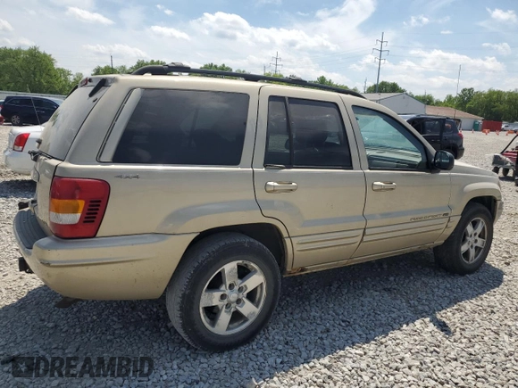 2000 Jeep Grand Cherokee Limited z VIN 1J4GW58N0YC272532, wystawiony jako Copart lot #57524225 z przebiegiem 238 921 mil mil oraz Szkoda całkowita • Salvage title. Historia ofert i sprzedaży dostępna na DreamBid. Obrazek 3.