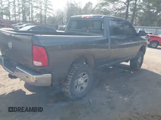 2016 Ram 2500 Tradesman with VIN 3C6UR5CL5GG162293, listed as a IAAI auction lot 41524815 with 243,012 mi miles and . Bid and sale history available at DreamBid. Image 4.