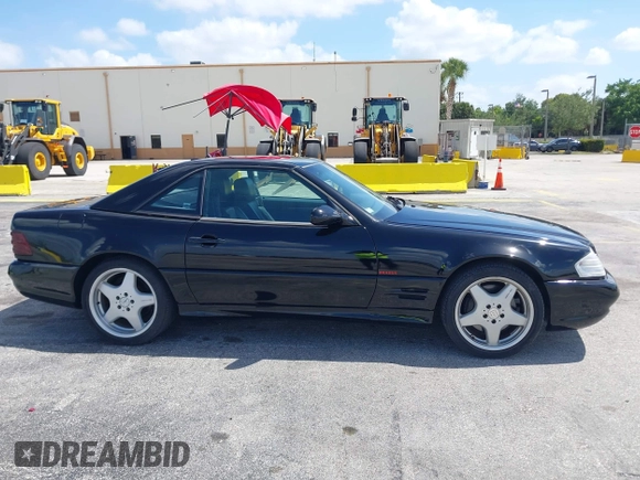 2001 Mercedes-Benz SL-Class with VIN WDBFA68F71F196390, listed as a IAAI auction lot 42128119 with 65,010 mi miles. Bid and sale history available at carsss.com. Image 13.