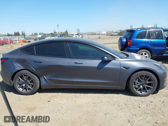 2023 Tesla Model 3 z VIN 5YJ3E1EA2PF404614, wystawiony jako IAAI lot #42009539 z przebiegiem 22 105 mil mil oraz . Historia ofert i sprzedaży dostępna na DreamBid. Obrazek 12.