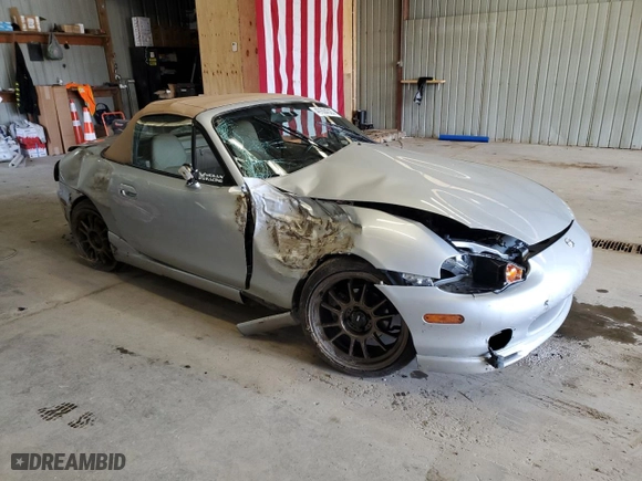 2000 Mazda MX-5 Miata with VIN JM1NB3536Y0154227, listed as a Copart auction lot 49604325 with 62,045 mi miles and Salvage Title. Bid and sale history available at carsss.com. Image 4.