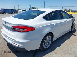2020 Ford Fusion SE with VIN 3FA6P0H73LR131988, listed as a IAAI auction lot 42468239 with 104,832 mi miles and . Bid and sale history available at DreamBid. Image 4.