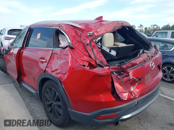 2016 Mazda CX-9 Grand Touring with VIN JM3TCADY0G0107481, listed as a IAAI auction lot 42043612 with Not Provided miles and . Bid and sale history available at DreamBid. Image 3.