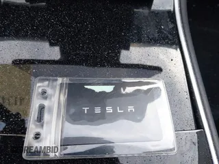 2018 Tesla Model 3 Long Range Battery with VIN 5YJ3E1EB8JF115138, listed as a IAAI auction lot 41343399 with 62,351 mi miles and . Bid and sale history available at DreamBid. Image 11.