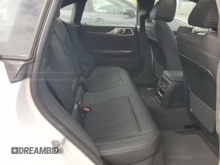 2024 BMW i4 eDrive35 z VIN WBY43AW00RFT22457, wystawiony jako Copart lot #53167205 z przebiegiem 3329 mil mil oraz Szkody całkowita. Historia ofert i sprzedaży dostępna na DreamBid. Obrazek 10.