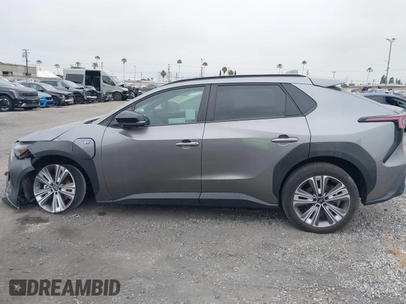 2024 Subaru Solterra Premium z VIN JTMABABA2RA056054, wystawiony jako IAAI lot #42018399 z przebiegiem 6 220 mil mil oraz . Historia ofert i sprzedaży dostępna na DreamBid. Obrazek 15.