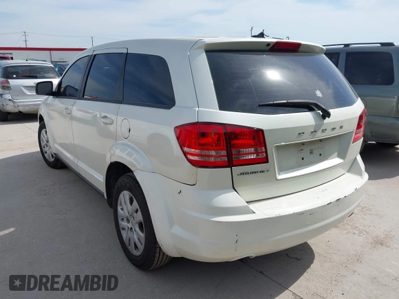 2013 Dodge Journey American Value with VIN 3C4PDCAB0DT723988, listed as a IAAI auction lot 42263191 with 205,014 mi miles and . Bid and sale history available at DreamBid. Image 3.