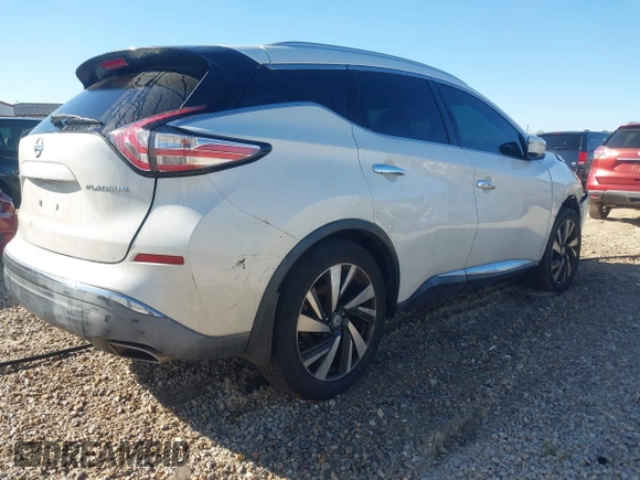 2015 Nissan Murano Platinum z VIN 5N1AZ2MG7FN265552, wystawiony jako IAAI lot #41828490 z przebiegiem 211 465 mil mil oraz . Historia ofert i sprzedaży dostępna na DreamBid. Obrazek 4.