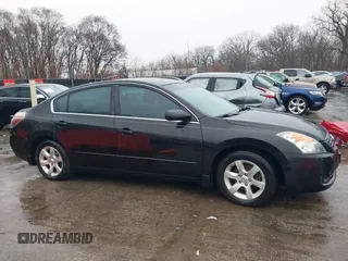 2009 Nissan Altima SL with VIN 1N4AL21E59N427861, listed as a IAAI auction lot 41692000 with 139,371 mi miles and . Bid and sale history available at DreamBid. Image 13.