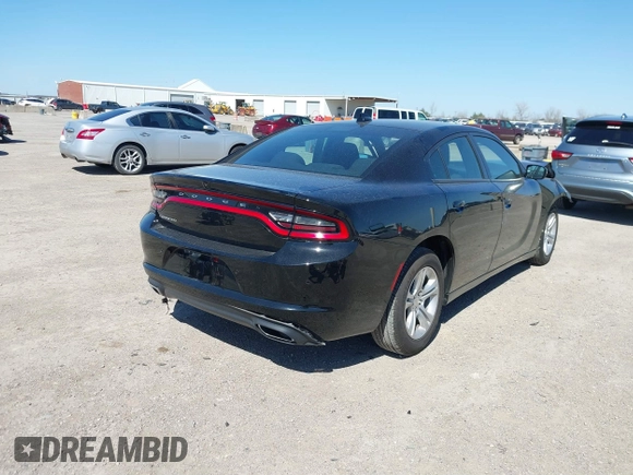 2023 Dodge Charger SXT with VIN 2C3CDXBG2PH528802, listed as a IAAI auction lot 41768288 with 57,170 mi miles. Bid and sale history available at carsss.com. Image 4.