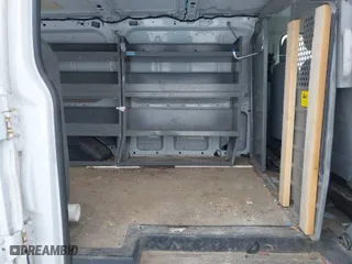 2015 Ford Transit Cargo Van with VIN 1FTNR1ZM7FKA35185, listed as a IAAI auction lot 41621539 with 198,015 mi miles. Bid and sale history available at carsss.com. Image 8.