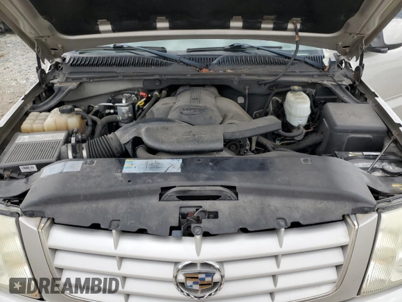 2004 Cadillac Escalade z VIN 1GYEK63N04R309148, wystawiony jako Copart lot #51259085 z przebiegiem 106 646 mil mil oraz Czysty tytuł • Clean title. Historia ofert i sprzedaży dostępna na DreamBid. Obrazek 12.