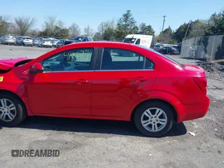 2013 Chevrolet Sonic LT with VIN 1G1JC5SH4D4169926, listed as a IAAI auction lot 41930121 with 105,351 mi miles and . Bid and sale history available at DreamBid. Image 14.