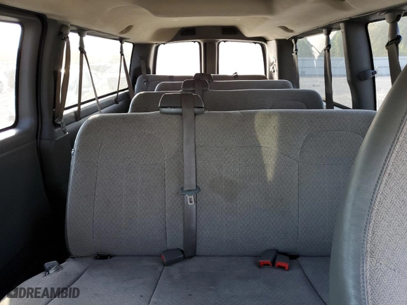 2013 Chevrolet Express Passenger 1LT with VIN 1GAZG1FA0D1172692, listed as a Copart auction lot 75411454 with 159,250 mi miles and Salvage Title. Bid and sale history available at carsss.com. Image 10.
