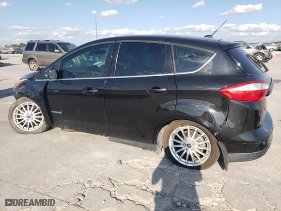 2015 Ford C-Max Hybrid SEL with VIN 1FADP5BUXFL120928, listed as a Copart auction lot 72073924 with 124,522 mi miles and Salvage Title. Bid and sale history available at carsss.com. Image 2.