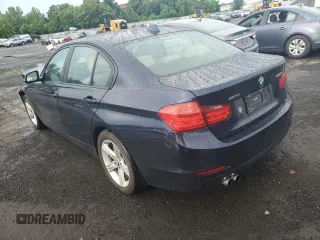 2015 BMW 3 Series 328i xDrive with VIN WBA3B5C59FF963090, listed as a Copart auction lot 62579735 with 53,400 mi miles and Salvage title. Bid and sale history available at DreamBid. Image 2.