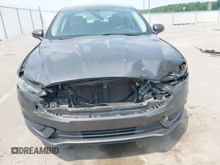 2017 Ford Fusion Hybrid SE with VIN 3FA6P0LUXHR279771, listed as a IAAI auction lot 42417831 with 189,493 mi miles and . Bid and sale history available at DreamBid. Image 6.