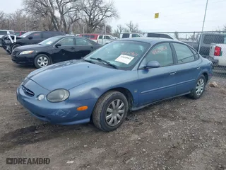 1999 Ford Taurus SE with VIN 1FAFP53S8XA278221, listed as a IAAI auction lot 41820964 with 115,109 mi miles. Bid and sale history available at carsss.com. Image 2.