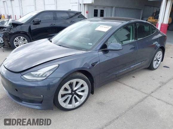 2021 Tesla Model 3 Long Range with VIN 5YJ3E1EB4MF855581, listed as a IAAI auction lot 41974515 with 71,561 mi miles. Bid and sale history available at carsss.com. Image 22.
