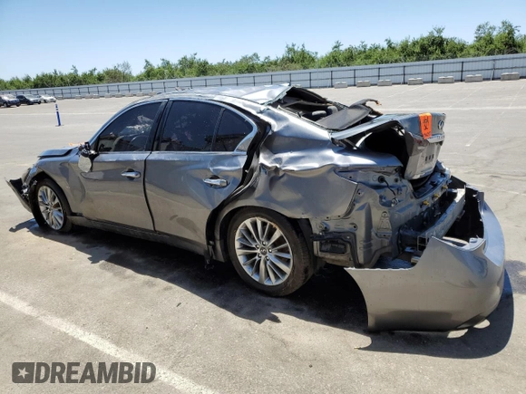 2019 Infiniti Q50 Signature Edition with VIN JN1EV7AP7KM517239, listed as a Copart auction lot 58093944 with 63,177 mi miles and Salvage Title. Bid and sale history available at DreamBid. Image 2.