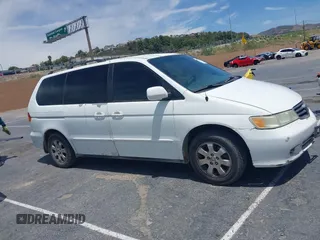 2003 Honda Odyssey EX-L z VIN 5FNRL18033B095684, wystawiony jako IAAI lot #42289617 z przebiegiem 174 336 mil mil oraz . Historia ofert i sprzedaży dostępna na DreamBid. Obrazek 13.