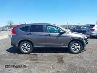 2014 Honda CR-V EX with VIN 2HKRM4H50EH628721, listed as a IAAI auction lot 42064143 with 103,009 mi miles and . Bid and sale history available at carsss.com. Image 13.